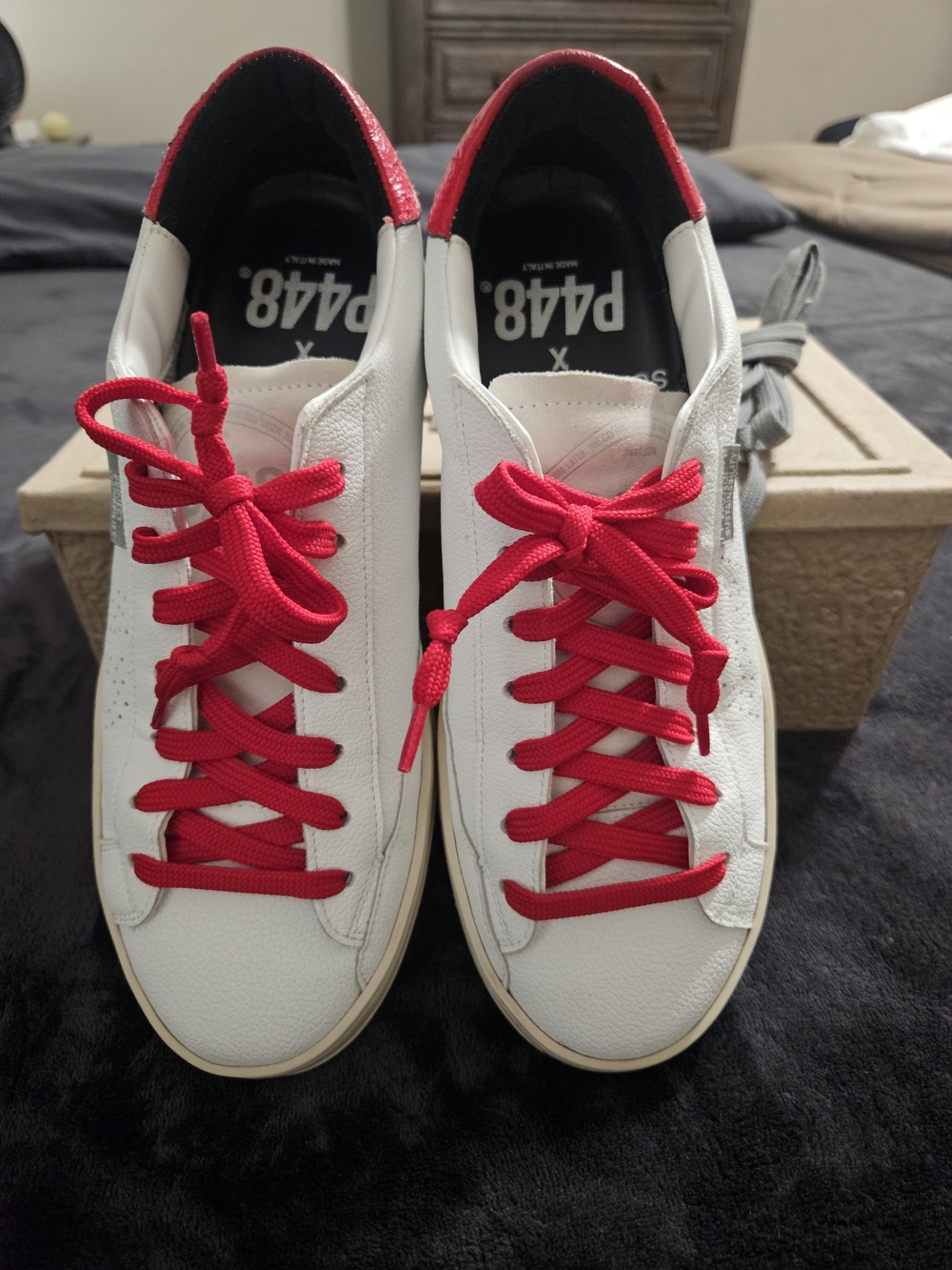 P448 White Sneakers with Red Laces and Red Heel Accent